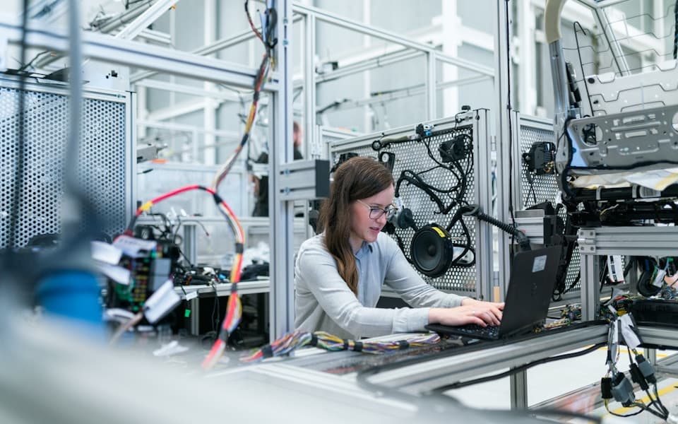 Manufacturing operators working on a production line in a plant
