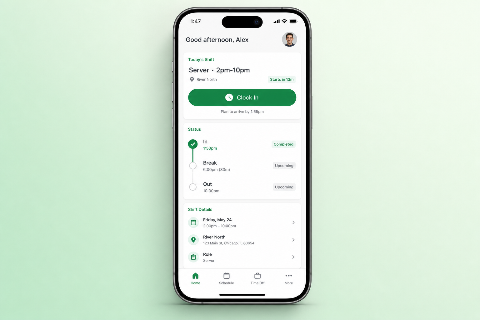 Employee clocking in from a mobile app with the published shift visible on screen